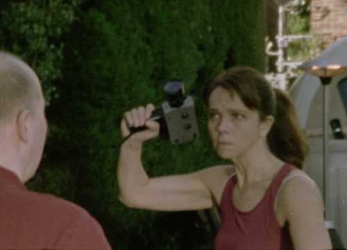 Mandy wielding Super 8 camera