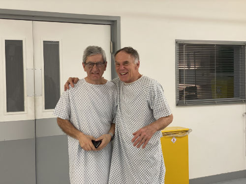 JS and David Jordan in hospital gowns