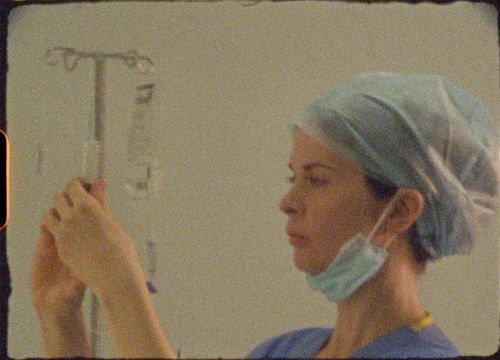 Carnett holding syringe